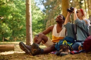 People looking through binoculars, representing looking ahead to proven marketing strategies